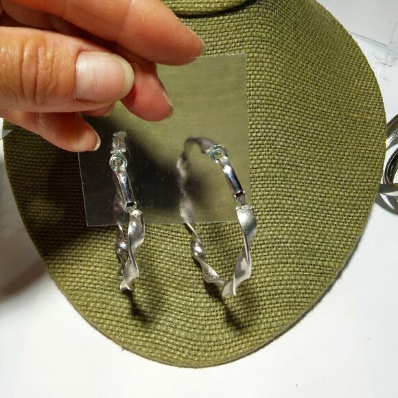 Women`s silver tone twist hoop earrings. 2 1/4 inc - Picture 3 of 3